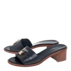 مملوكة مسبقًا Louis Vuitton Black Leather Lock It Mule Sandals Size 37