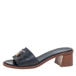 مملوكة مسبقًا Louis Vuitton Black Leather Lock It Mule Sandals Size 37