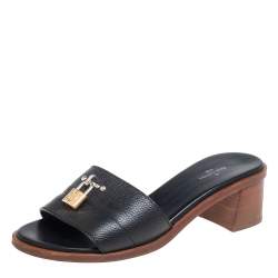 مملوكة مسبقًا Louis Vuitton Black Leather Lock It Mule Sandals Size 37