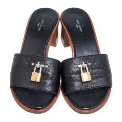 مملوكة مسبقًا Louis Vuitton Black Leather Lock It Mule Sandals Size 37