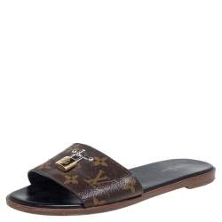 Lock it leather sandals Louis Vuitton Brown size 38 EU in Leather