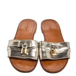 Pre Owned Louis Vuitton Silver Leather Lock It Slide Sandals Size 37.5