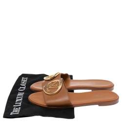 مملوكة مسبقًا Louis Vuitton Brown Leather Lock It Slide Sandals Size 37.5