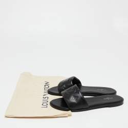 مملوكة مسبقًا Louis Vuitton Black Monogram Embossed Leather Revival Flat Slides Size 38