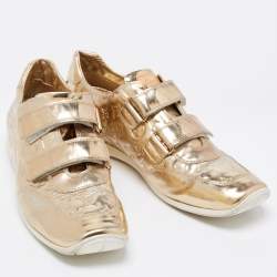 مملوكة مسبقًا Louis Vuitton Metallic Gold Monogram Empreinte Leather Sneakers Size 40.5