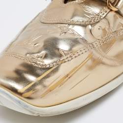 مملوكة مسبقًا Louis Vuitton Metallic Gold Monogram Empreinte Leather Sneakers Size 40.5