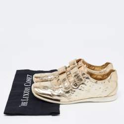 مملوكة مسبقًا Louis Vuitton Metallic Gold Monogram Empreinte Leather Sneakers Size 40.5