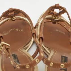 مملوكة مسبقًا Louis Vuitton Metallic Gold/Brown Leather Wedge Sandals Size 38.5   