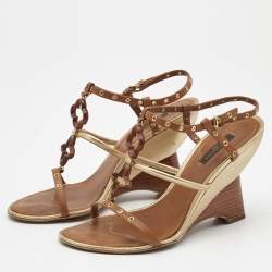 مملوكة مسبقًا Louis Vuitton Metallic Gold/Brown Leather Wedge Sandals Size 38.5   