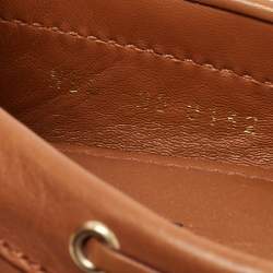 Pre Owned Louis Vuitton Brown Monogram Embossed Leather Gloria Loafers Size 38