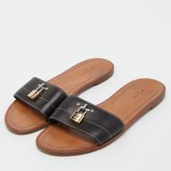مملوكة مسبقًا Louis Vuitton Black Leather Lock It Flat Slides Size 38