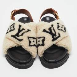 مملوكة مسبقًا Louis Vuitton White/Brown Fur and Leather Slingback Flat Sandals Size 39