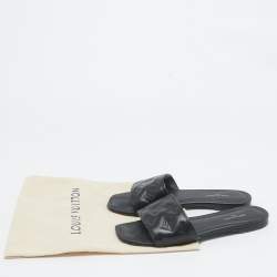 مملوكة مسبقًا Louis Vuitton Black Embossed Leather Revival Flat Slides Size 38