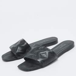 مملوكة مسبقًا Louis Vuitton Black Embossed Leather Revival Flat Slides Size 38