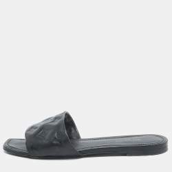 مملوكة مسبقًا Louis Vuitton Black Embossed Leather Revival Flat Slides Size 38