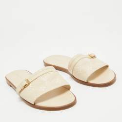 Louis Vuitton Cream Monogram Embossed Leather Flat Slides Size 40