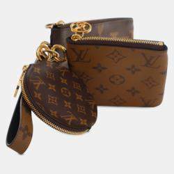 Pre Owned Louis Vuitton Monogram Reverse Giant Trio Pouch