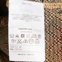 Pre Owned تنورة ميدي إم ميزوني تريكو بنمط زهري بيج/أسود مقاس متوسط