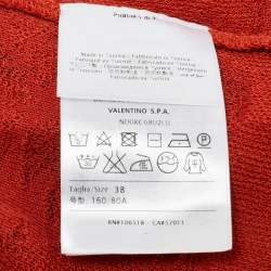 مملوكة مسبقًا توب إم ميسوني تريكو مورد برتقالي بأكمام طويلة مقاس وسط ( ميديوم )