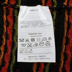 مملوكة مسبقًا توب إم ميزوني تريكو بوانتل برتقالي وأسود بأكمام طويلة مقاس وسط (ميديم)