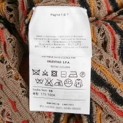 مملوكة مسبقًا توب إم ميزوني تريكو بوانتل برتقالي وأسود بأكمام ط�ويلة مقاس وسط (ميديم)