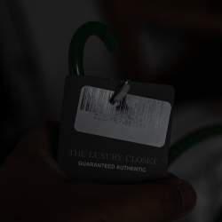 مملوكة مسبقًا توب بكم طويل إم ميسوني نمط تريكو برتقالي مقاس و سط ( ميديوم )