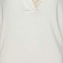 مملوكة مسبقًا بلوزة فويج باي مارينا رينالدي بفتحة عنق على شكل V محبوكة قابلة للتمدد بلون كريمي مقاس كبير