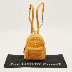 Pre Owned MCM Stark Mini Yellow Leather Studded Backpack
