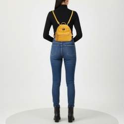 Pre Owned MCM Stark Mini Yellow Leather Studded Backpack