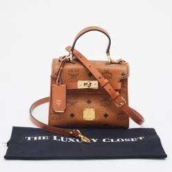 Pre Owned MCM Brown Visetos Coated Canvas and Leather Embellished Mini Heritage Top Handle Bag