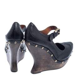 Pre Owned McQ By Alexander McQueen Black Leather Studded Wedge Pumps Size 38