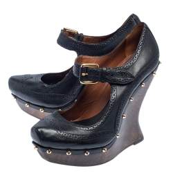 Pre Owned McQ By Alexander McQueen Black Leather Studded Wedge Pumps Size 38