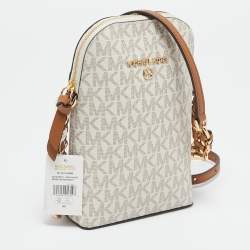 Pre Owned Michael Kors White Signature Coated Canvas and Leather Small Jet Set Charm NS Phone Crossbody Bag