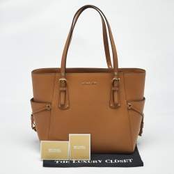 Pre Owned Michael Kors Brown Leather East West Voyager Tote