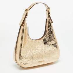 مملوكة مسبقًا حقيبة هوبو مايكل كورس نولييتا جلد براءة اختراع مجعد ذهبي صغيرة