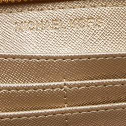 Pre Owned محفظة مايكل كورس جيت سيت جلد ذهبي بسحاب محيط