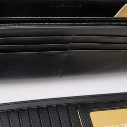 مملوكة مسبقًا محفظة بحمالة معصم مايكل مايكل كورس كانفاس مقوى بشعارالماركة بسحاب مستدير