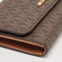 Pre Owned Michael Kors Brown Signature Coated Canvas Large Jet Set Travel Trifold Wallet