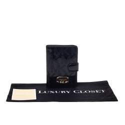 Michael Kors Black Perforated Signature Patent Leather Passport Holder