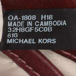 Pre Owned Michael Kors Burgundy/Brown Signature Coated Canvas and Leather Mott Crossbody Bag