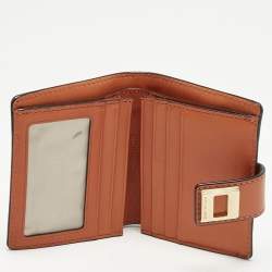 Pre Owned Michael Kors Beige/Orange Signature Coated Canvas Natalie Heritage Compact Wallet