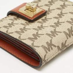 Pre Owned Michael Kors Beige/Orange Signature Coated Canvas Natalie Heritage Compact Wallet
