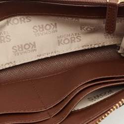 Pre Owned Michael Kors Beige/Dark Brown Signature Canvas and Leather Zip Around Wallet