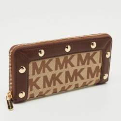 Pre Owned Michael Kors Beige/Dark Brown Signature Canvas and Leather Zip Around Wallet