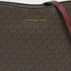 Pre Owned Michael Kors Burgundy/Brown Signature Coated Canvas and Leather Jet Set Travel Messenger Bag