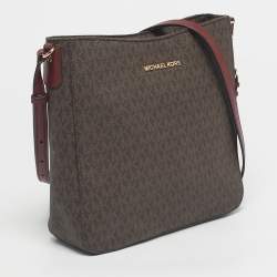 Pre Owned Michael Kors Burgundy/Brown Signature Coated Canvas and Leather Jet Set Travel Messenger Bag