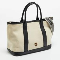 مملوكة مسبقًا حقيبة مايكل كورس لويزا وسط كانفاس أسود/طبيعي وجلد صناعي