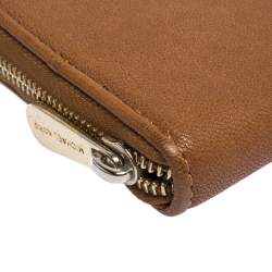 مملوكة مسبقًا Michael Kors Brown Leather Jet Set Zip Around Wallet