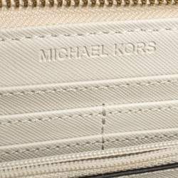 مملوكة مسبقًا محفظة مايكل كورس كانفاس أبيض مونوغرامي مقوى بسحاب ملتف