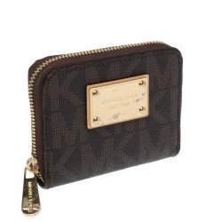 مملوكة مسبقًا محفظة مايكل كورس سحاب ملتف كانفاس مقوى شهيرة بنية